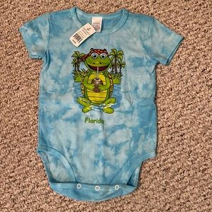 Tie Dye Florida frog onesie.  Size 2T.